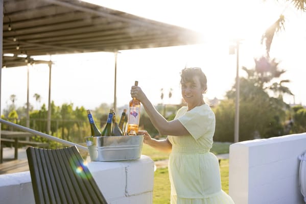 Resident enjoying an outdoor space with drinks