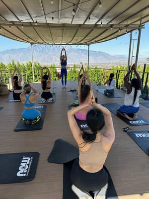 Residents participating in an outdoor yoga class