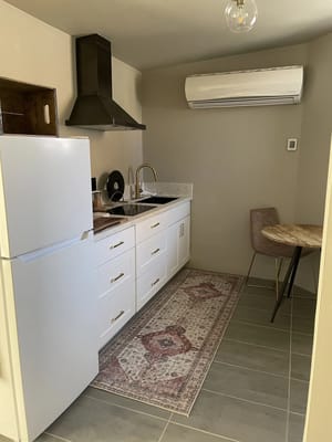 A modern kitchen space in a senior living unit