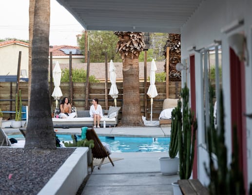 Residents enjoying the outdoor pool area