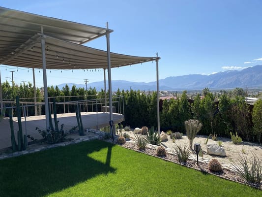 Outdoor patio area with mountain views