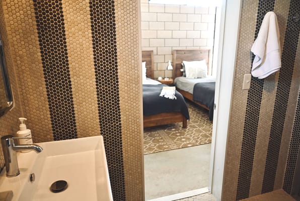 Interior view of a private resident room and bath