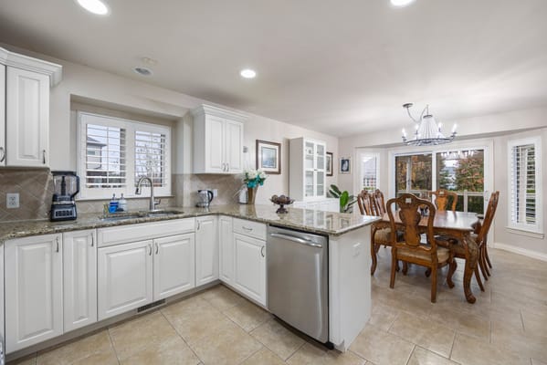 Bright kitchen and dining area in a senior living facility
