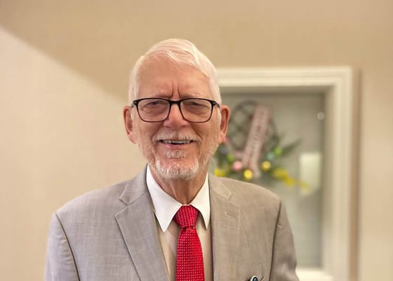 Resident smiling in a common area