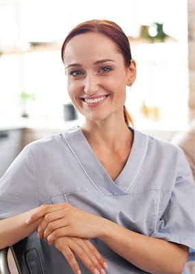 Smiling staff member in a care facility