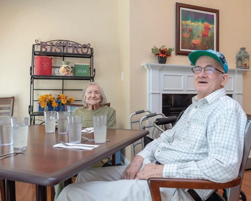 Residents enjoying time together in the dining area
