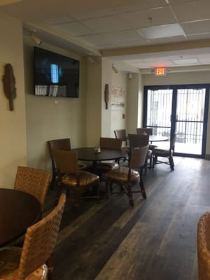 Interior of a common area with tables and chairs