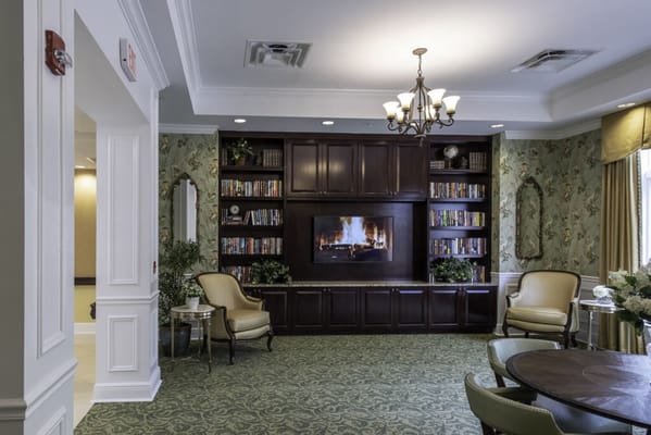 Interior common area with seating and fireplace