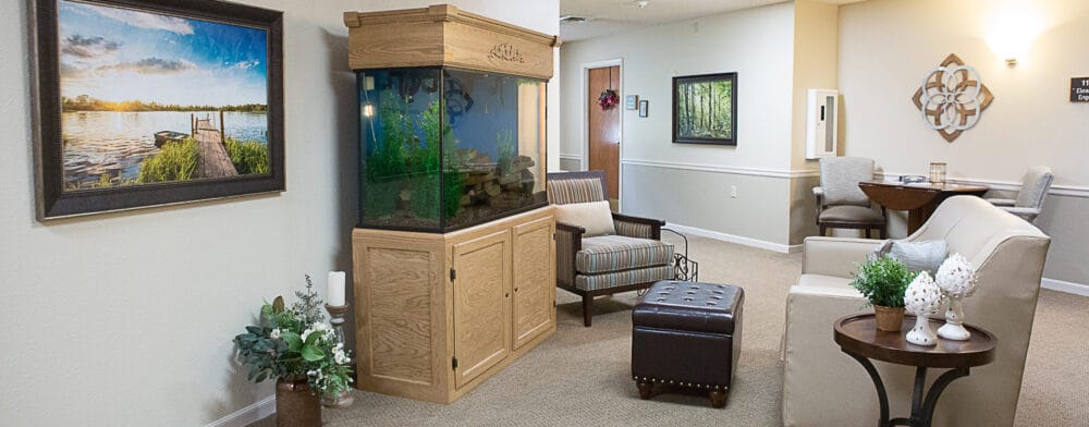 Interior common area with seating and aquarium