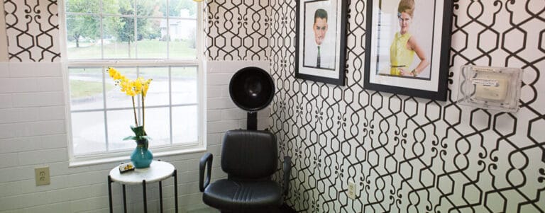 Interior view of a salon area with hair dryer
