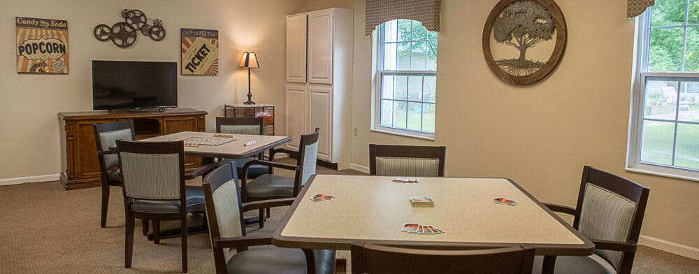 Cozy common area with tables and games