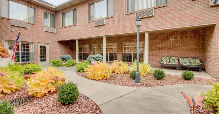 Outdoor garden area with colorful plants