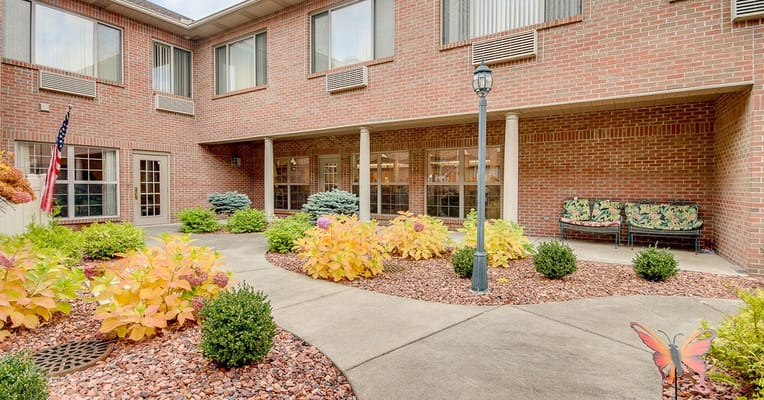 Outdoor garden area with colorful plants