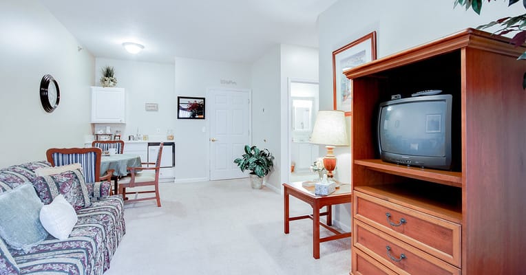 Cozy living area in a resident's room