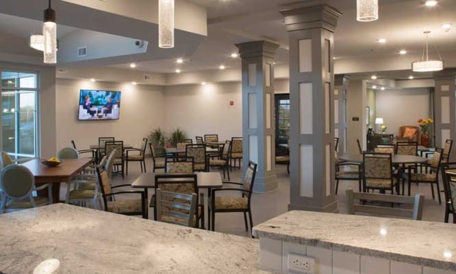 Bright dining area with tables and chairs
