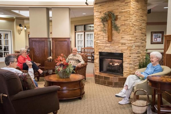 Residents socializing in a cozy common area