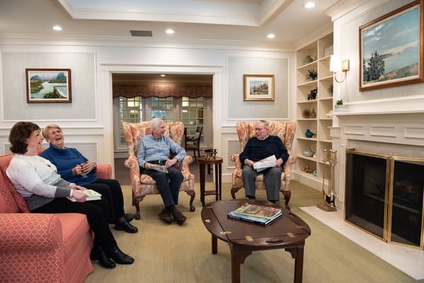 Residents socializing in a cozy common area