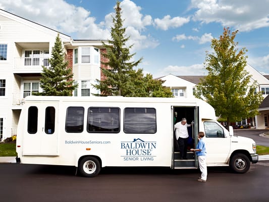 Facility transport vehicle with the logo on the side