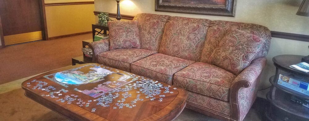 Cozy common area with a puzzle on the table