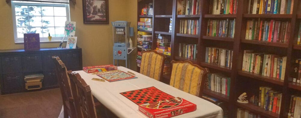 Activity room with bookshelves and board games