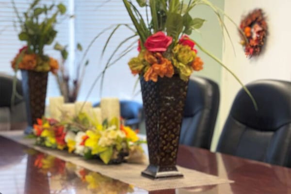 Elegant floral centerpieces on a conference table