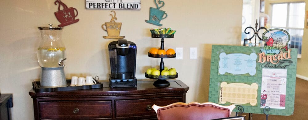 Dining area with a coffee station and fruit display