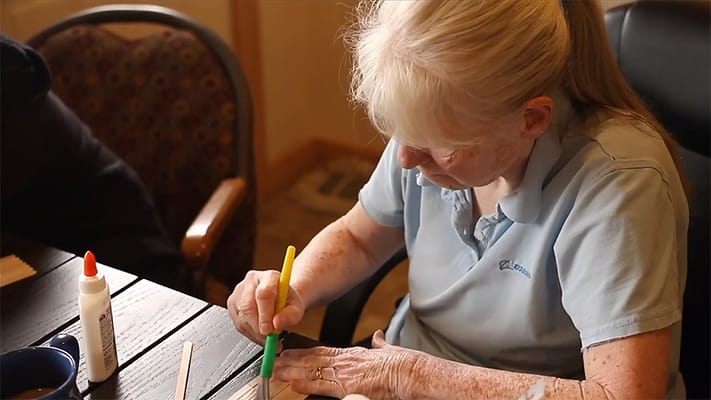Resident engaged in a crafting activity