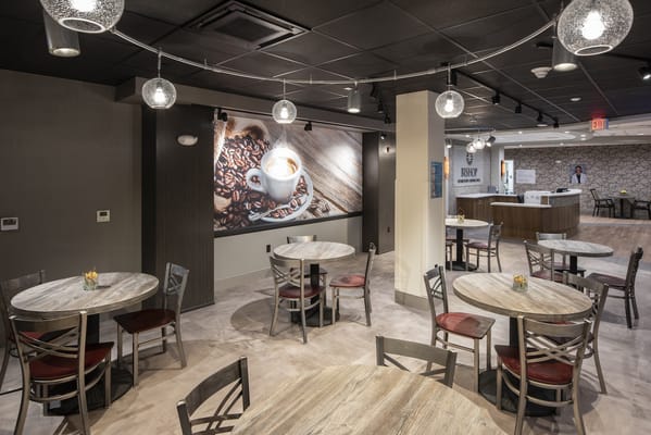 Bright dining area with modern tables and decor