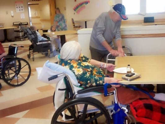 Residents interacting in a common activity space