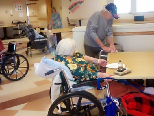 Residents interacting in a common activity space