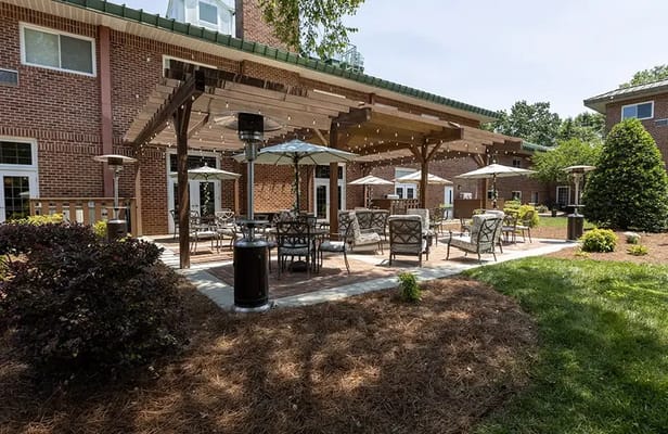 Outdoor courtyard with seating and umbrellas