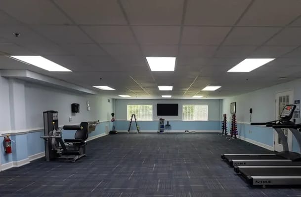Interior view of a fitness room with exercise equipment