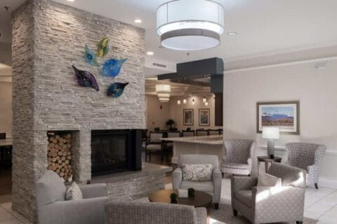 Interior common area with seating and fireplace