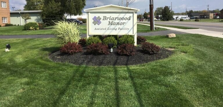 Sign for Briarwood Manor outside on the lawn