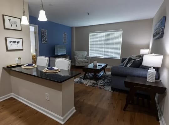 Bright, cozy living room in a resident unit