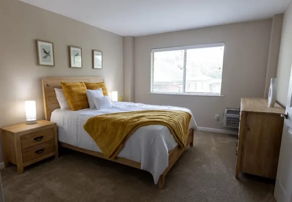 A bright resident bedroom with natural light