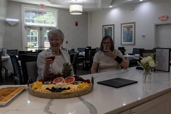 Residents enjoying refreshments in the dining area