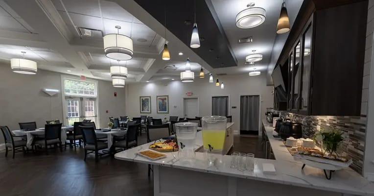 Bright dining room with refreshments and seating