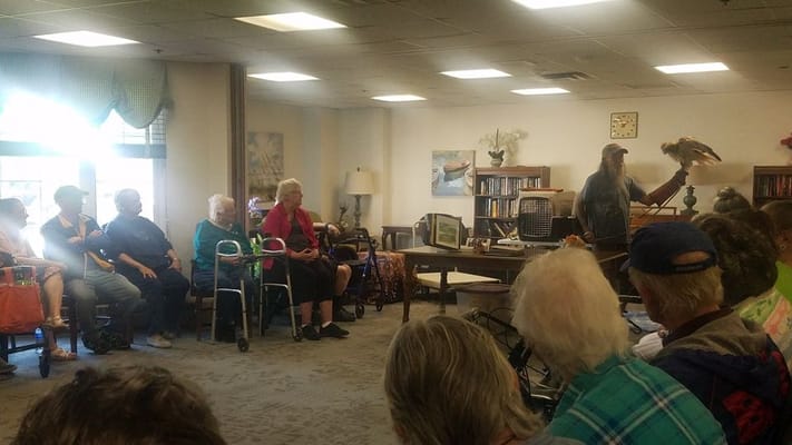 Residents attending an activity session in a common area
