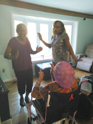 Residents enjoying a lively gathering in a common area