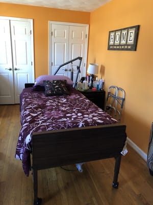 Private resident room with medical bed and decor