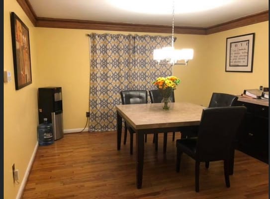 Interior of a dining area with a table and chairs