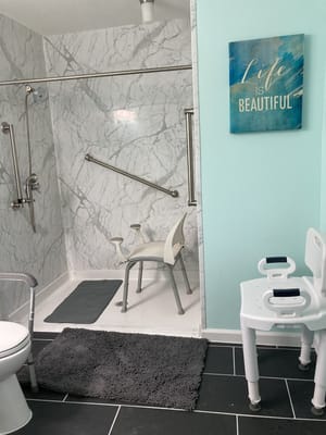 Accessible bathroom with safety features and decor