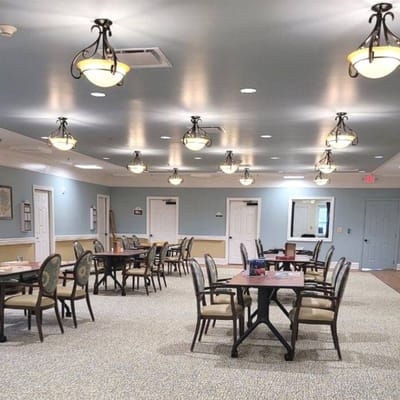 Bright dining room with tables and chairs