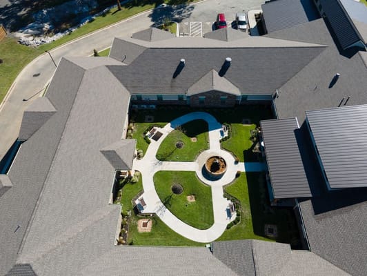 Aerial view of the facility's landscaped courtyard area