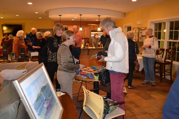 Residents engaging in a lively activity in a common area