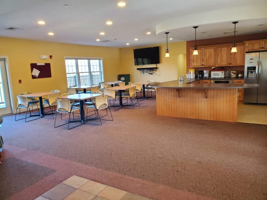 Bright dining area with tables and chairs