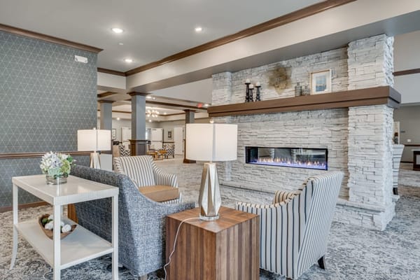 Comfortable seating area in a senior living facility lobby