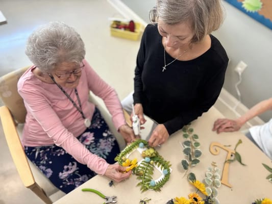 Residents engaging in a floral activity together