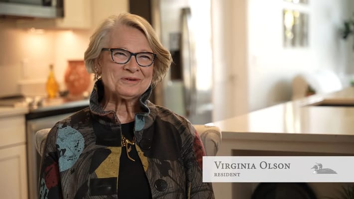 Resident Virginia Olson in a well-lit interior setting